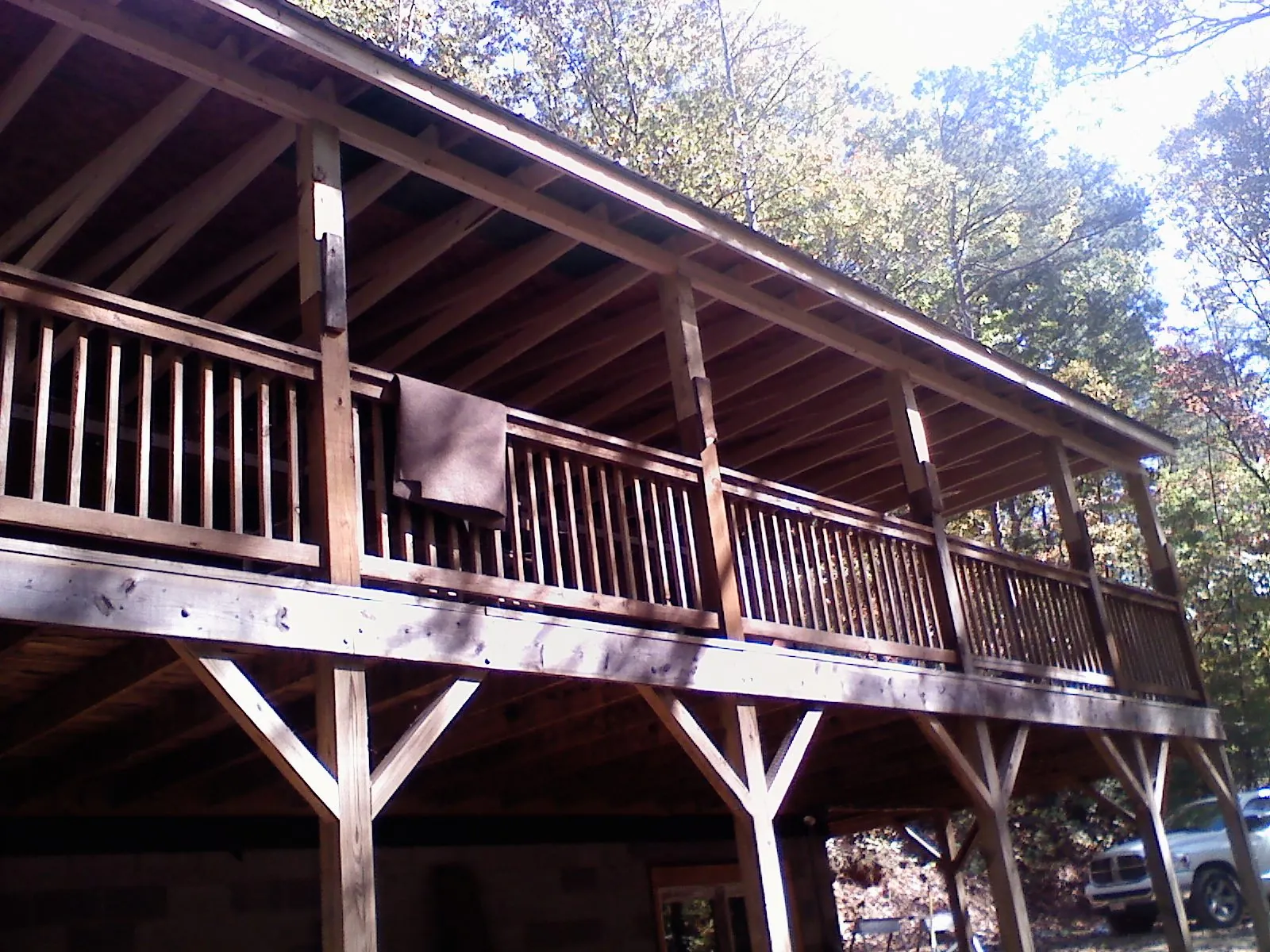 Timber framing under a new elevated porch and deck — Roof Leak Repair in Douglasville by Roofing Brothers